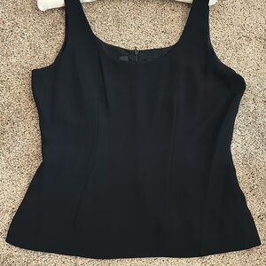 New with tag. Dana Buchman top. Size 10. Black sleeveless.